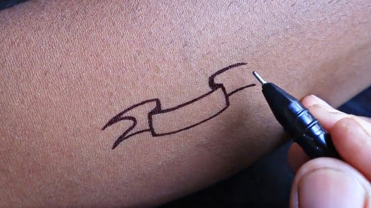 Making an amazing DAD  name tattoo