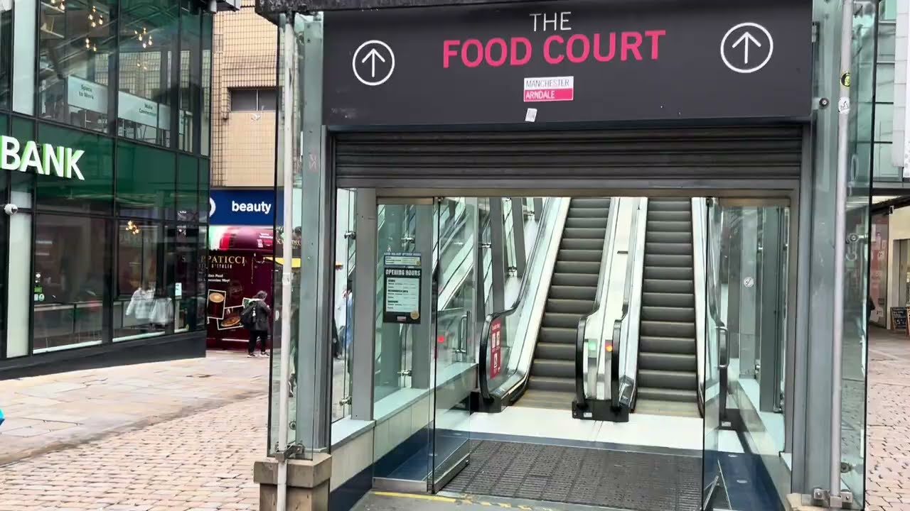 Manchester, England. 2x KONE escalators at Arndale Shopping centre food court (up from street level)