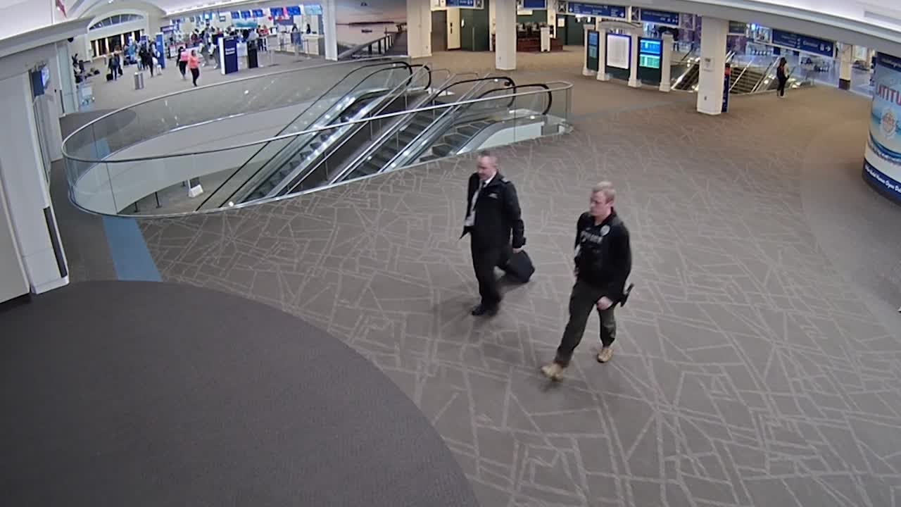 Raw video: Pilot seen in airport before DUI arrest