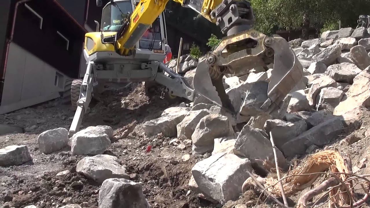 Menzi Muck M530 mit Universalgreifer - with universal grab