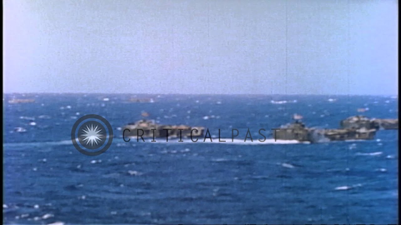 US LCTs (Landing Craft Tank) and LSTs (Landing Ship Tank) underway off the coast ...HD Stock Footage