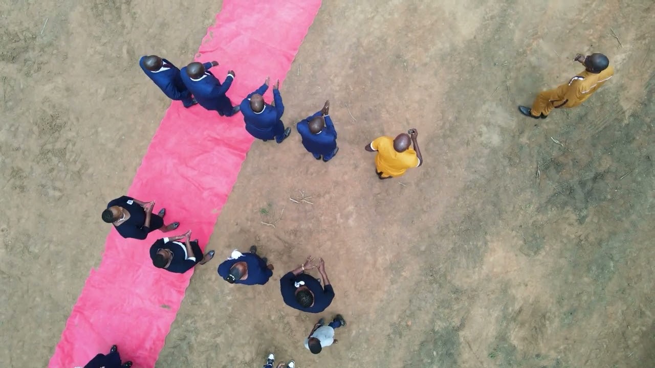 JOHN MBAKA AND JOHN KAY PERFOMANCE AT A BURIAL
