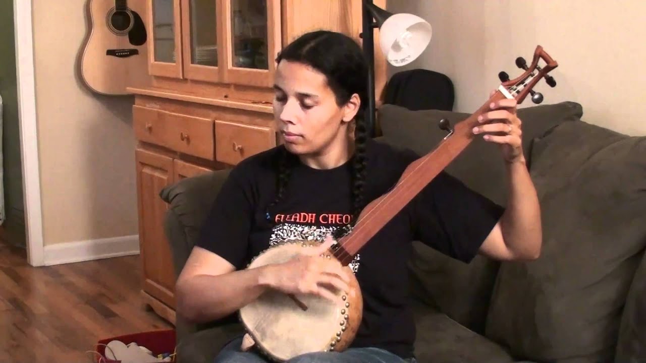 Rhiannon Giddens plays on her gourd banjo 