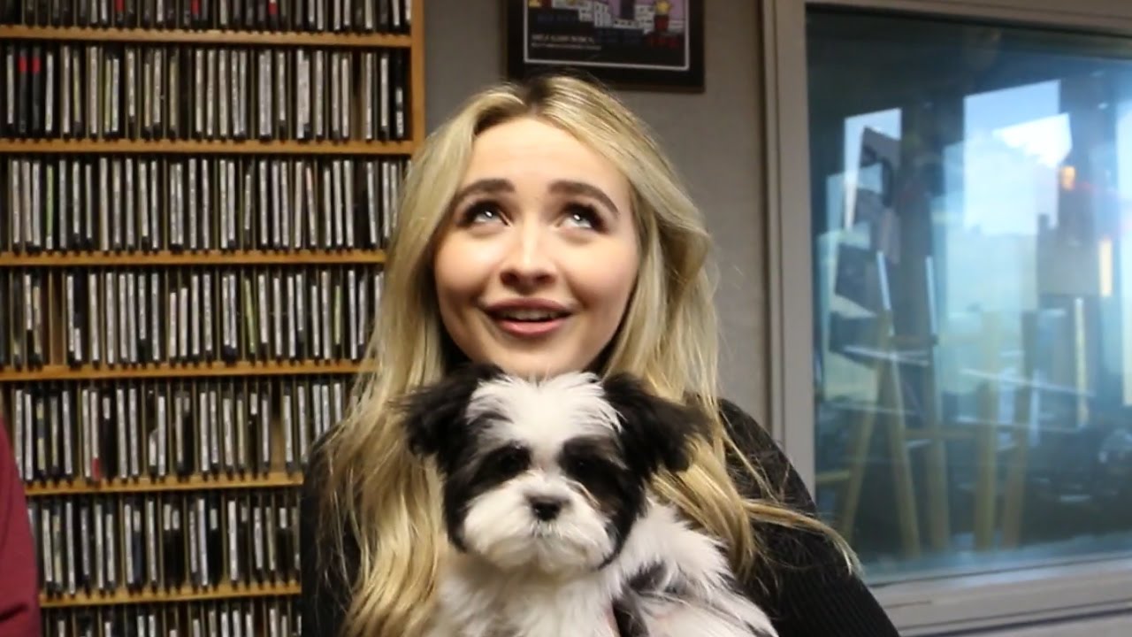 We make Sabrina Carpenter hold a PUPPY during our interview....