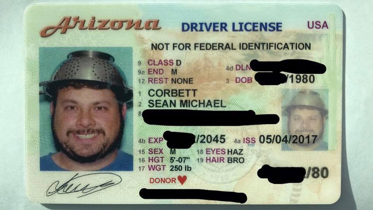 'Pastafarian' gets his AZ driver's license photo taken wearing a colander