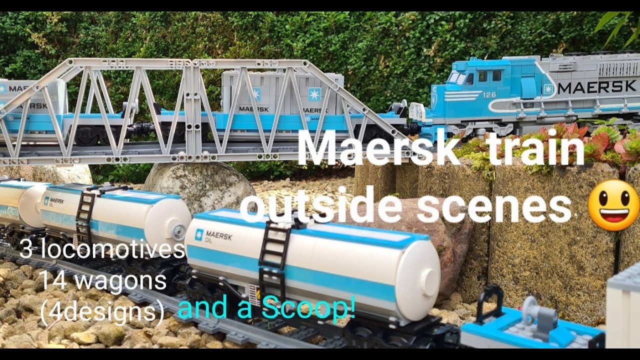 Multiple Lego Maersk trains and a scoop