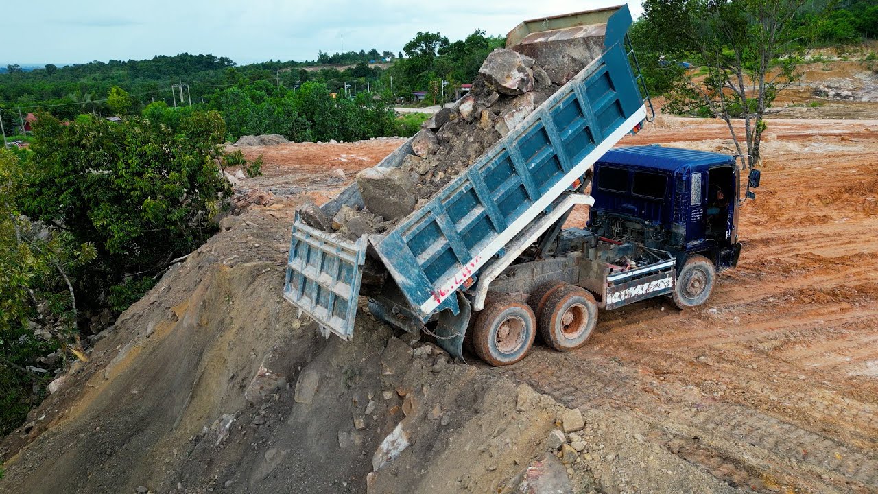 Technique Skills Land Filling On The Mountains With 10 Wheels Trucks Unloading & Dozer D37E Pushing