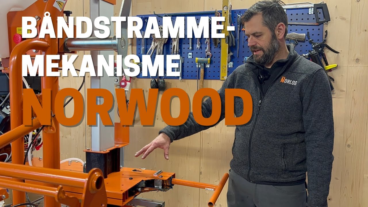 Hvordan fungerer båndstrammemekanismen på et Norwood båndsagbruk?