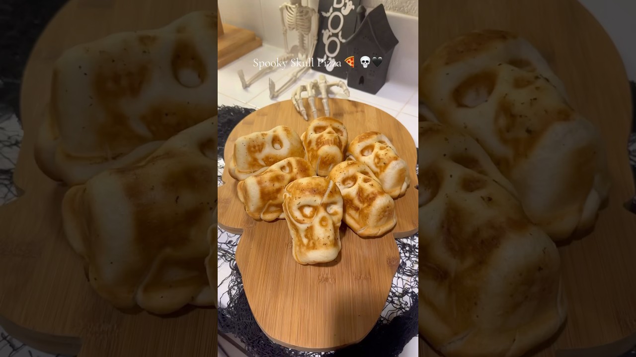 Spooky Pizza Skull Calzones 💀 #skullpizza #calzonepizza #yummy  #pizzaskulls #halloweendinner