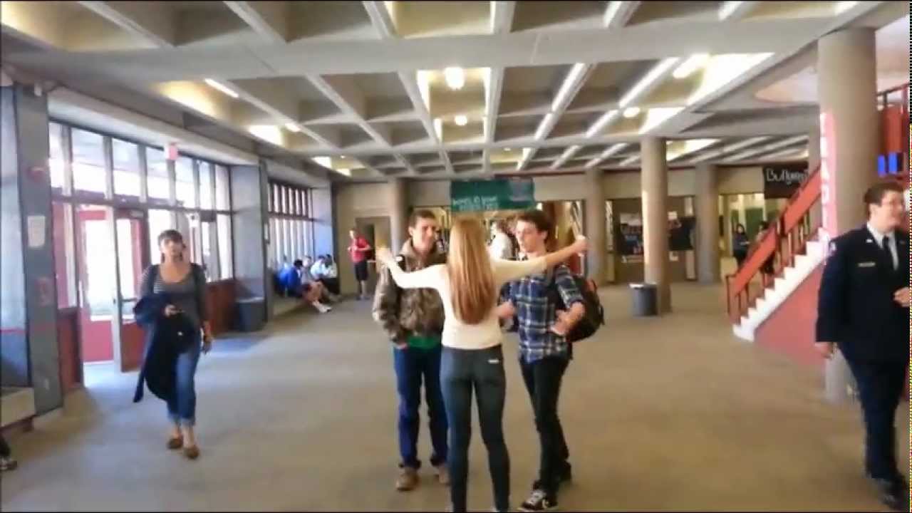 Love Your Strangers (hugging people at high school)