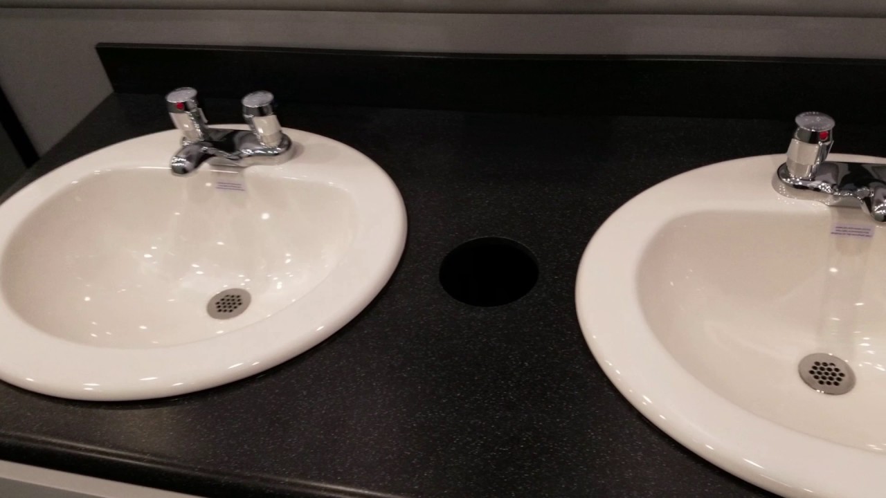 Portable Restroom Rentals | 13 Station Park Model Skid with ADA and Arctic