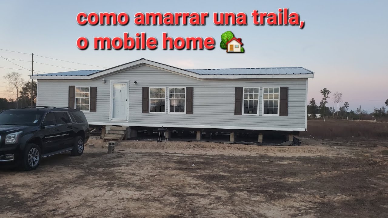Como amarrar una traila o mobile home tu mismo, no pagues$ es Caro.