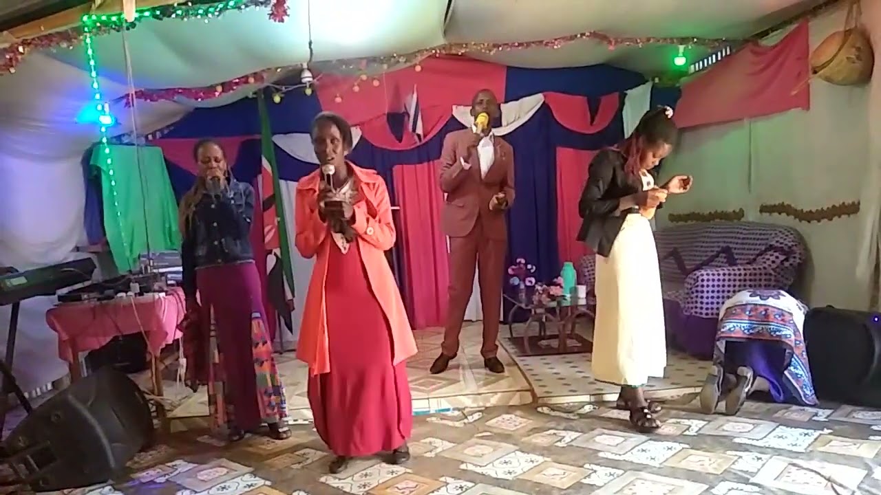 Pastor Robert Tumanka leading a mighty Worship at BCI-Narok-Ntulele