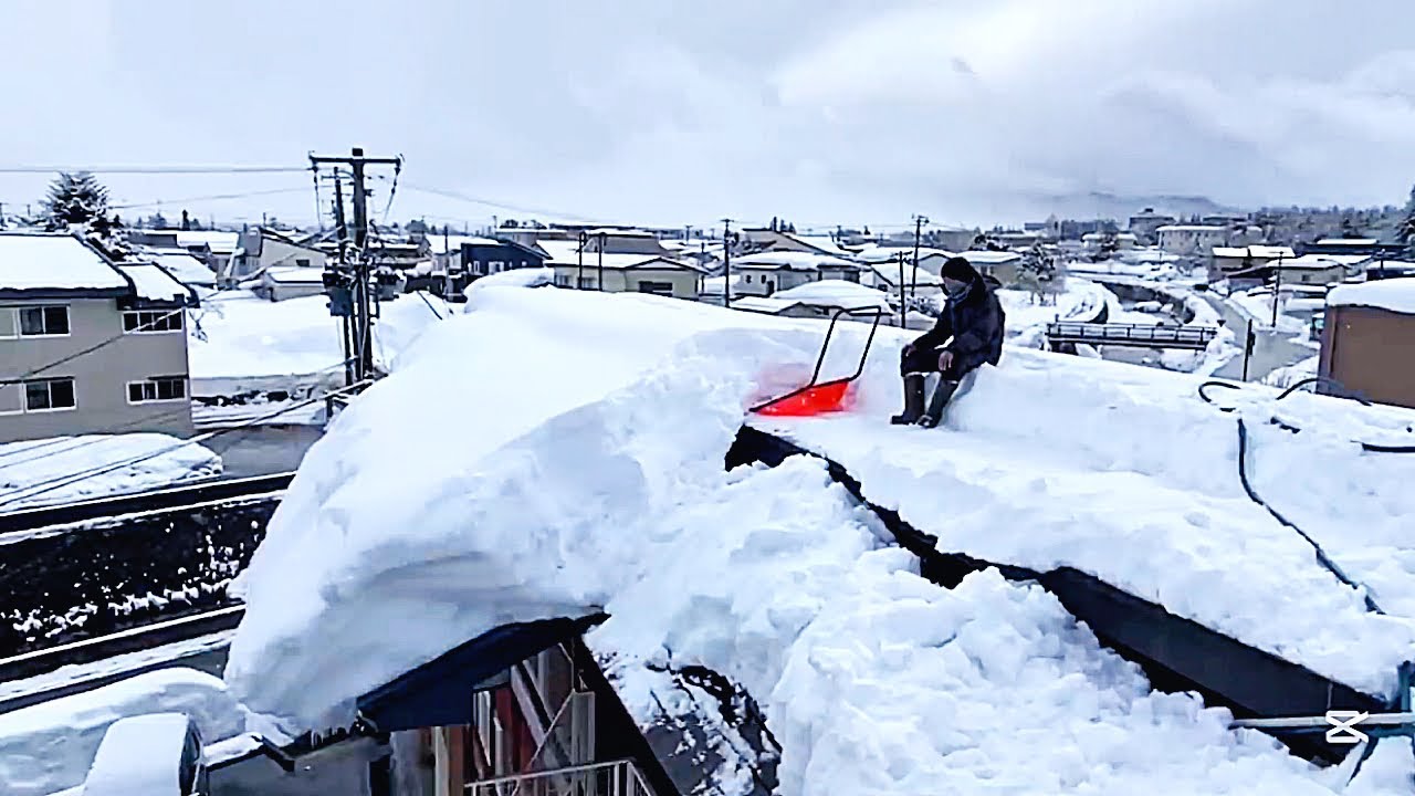 I climbed onto the roof for snow removal. #snowfall