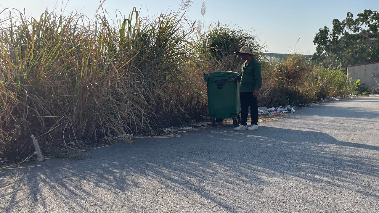 Is this the worst sidewalk I’ve ever cleaned? Trash, plants, the stench—it’s making me nauseous.