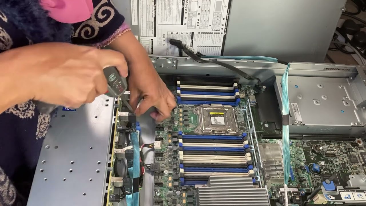 How to removed DL380 Gen 9 Hard Drive Cage
