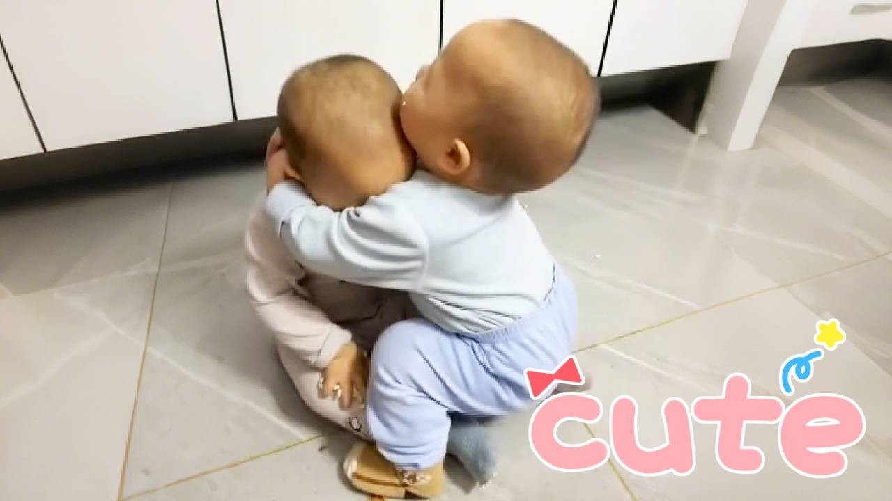 The older brother hugs his younger brother!#cutebaby #funny #twins #twin