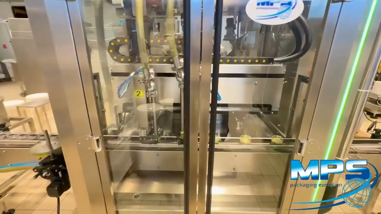 Filling and cupping machine for cream jars
