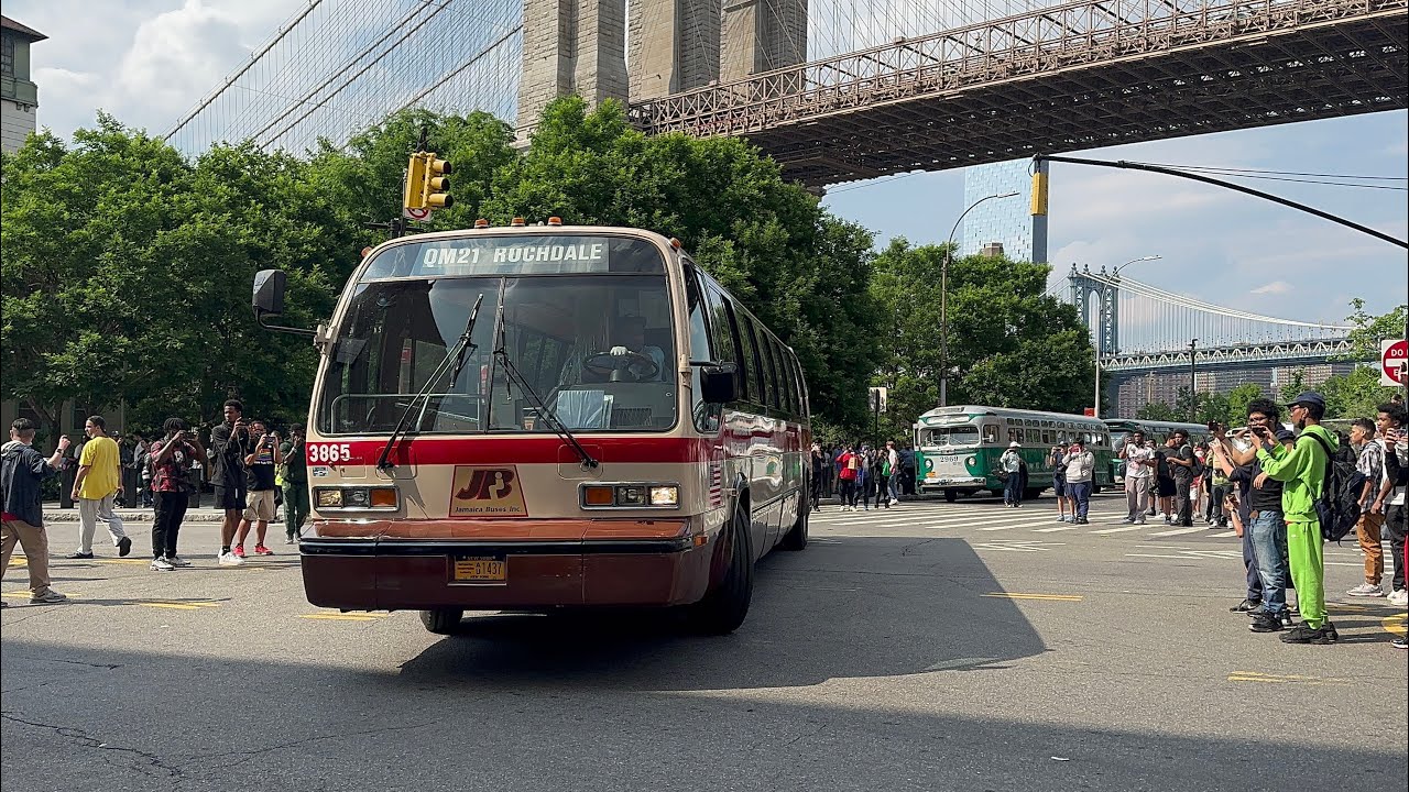 MTA Bus Festival 2023 Multiple MTA vintage buses leaving Brooklyn Bridge Park