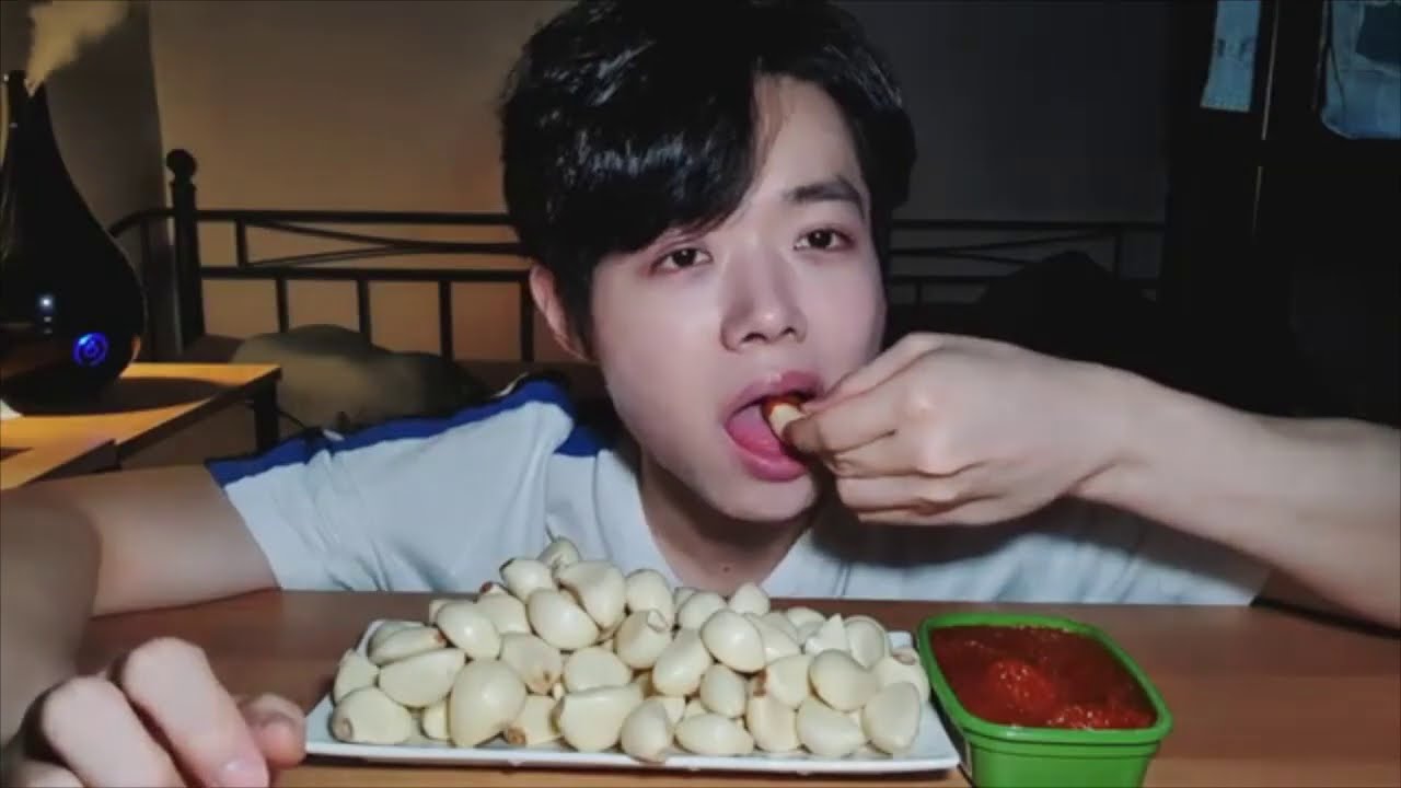 Mukbangers eating raw garlic and onions