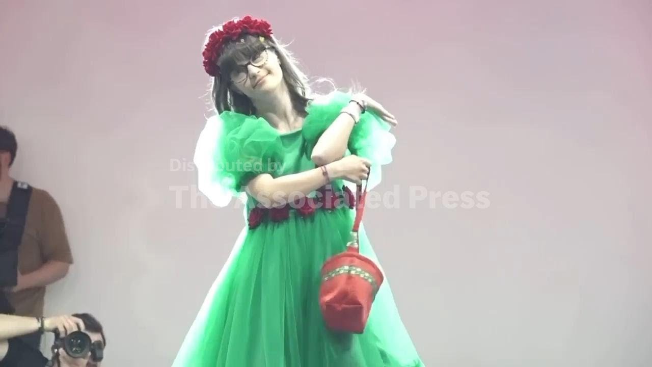 Dozens of models with Downs syndrome take to the catwalk at Bucharest fashion show