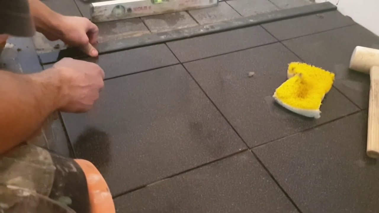 dorpel plaatsen in de cement