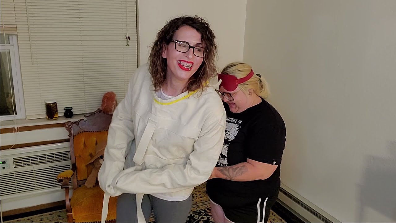 Escape your straitjacket or else be blindfolded!