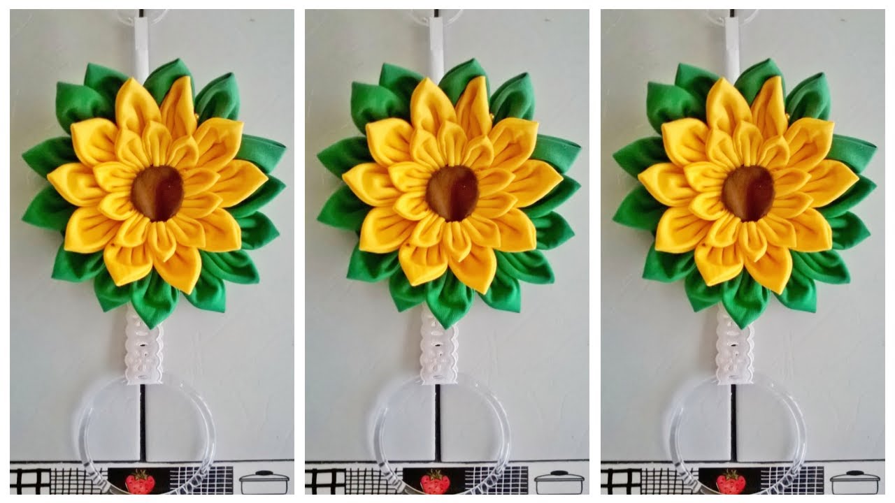PORTA PANO DE PRATO DE GIRASSOL FEITO DE FUXICOS