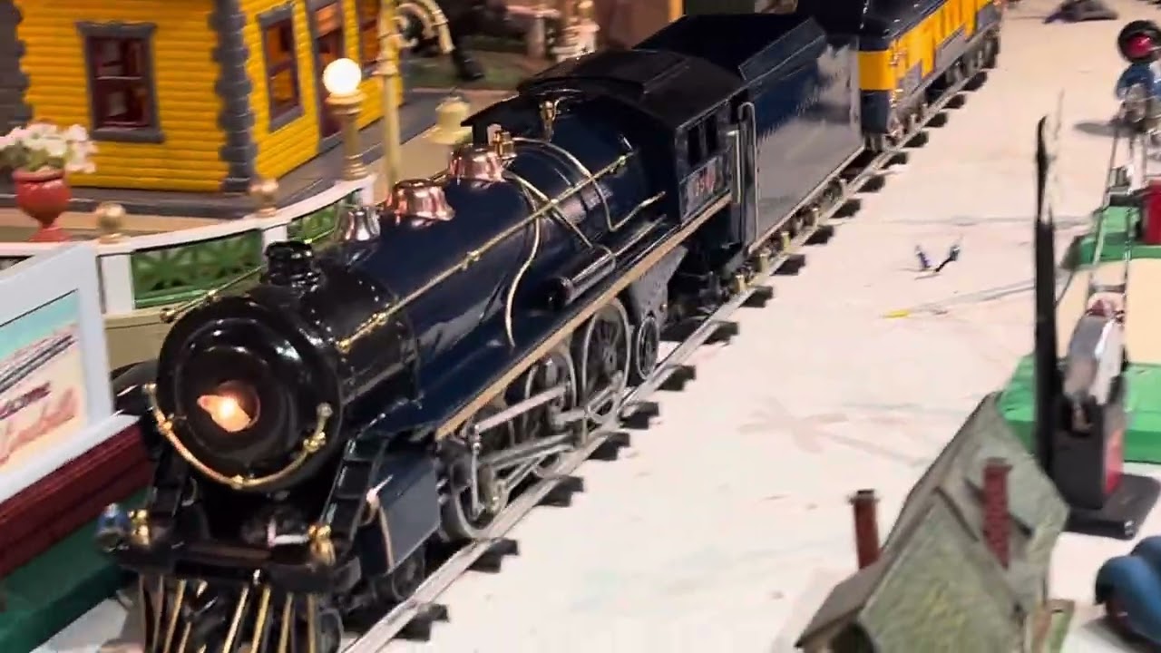 Ash Rajan Standard Gauge Blue Comet Boucher pulls striking cars including rare Pittsburg car. 