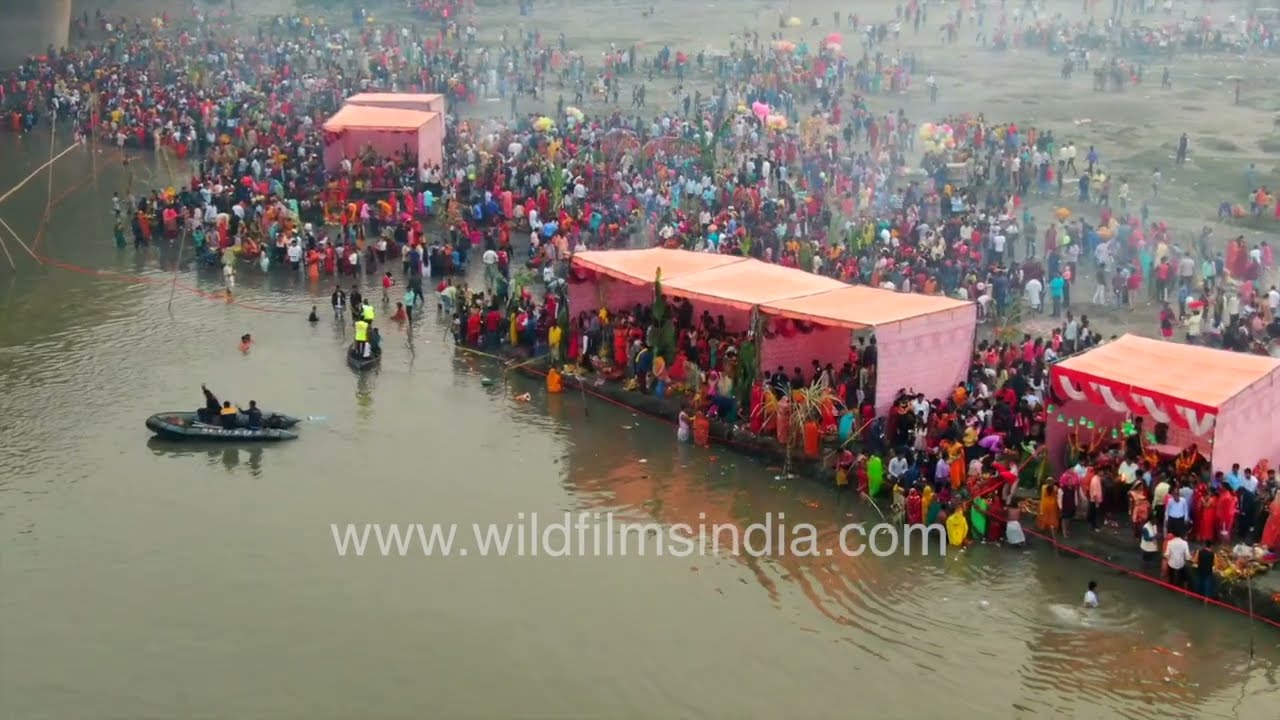 Chhath puja along Yamuna river : Aerial view of massive Hindu Purvanchali festival in early winter