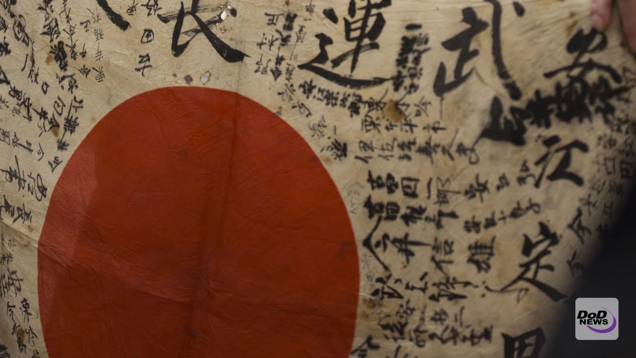 Marine Returns Flag to Family of Fallen Japanese WW II Soldier