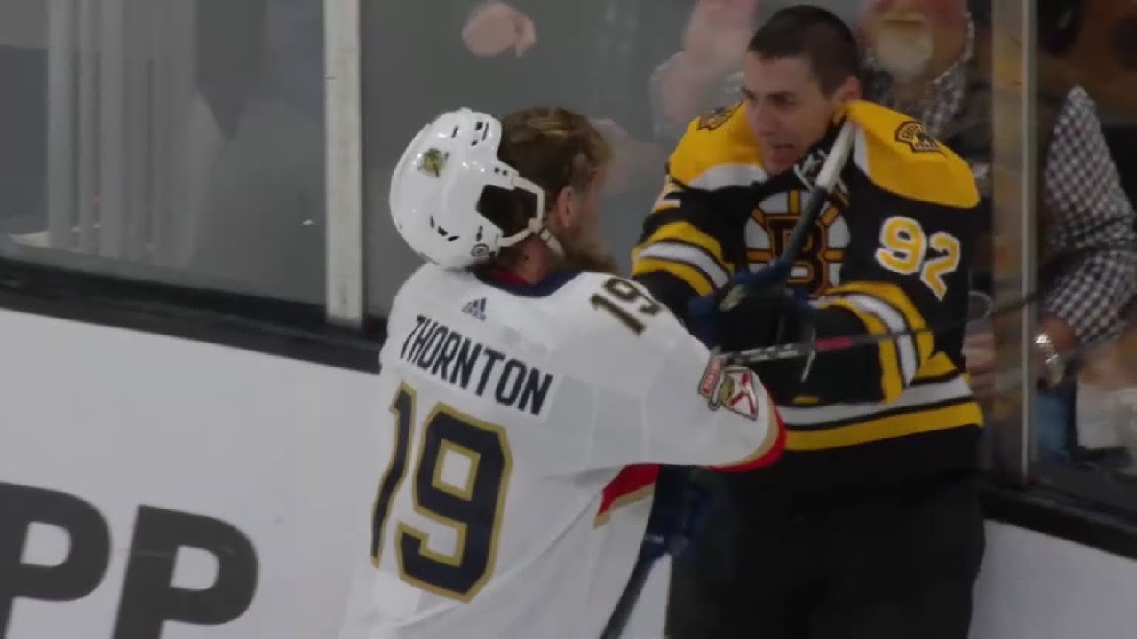 Joe Thornton going at it with Tom&aacute;&scaron; Nosek during a scrum between the Bruins and Panthers
