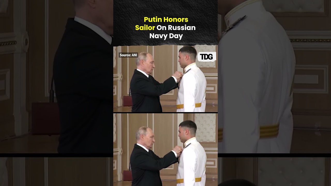 Putin Honors Sailor During Russian Navy Day Celebrations In St Petersburg