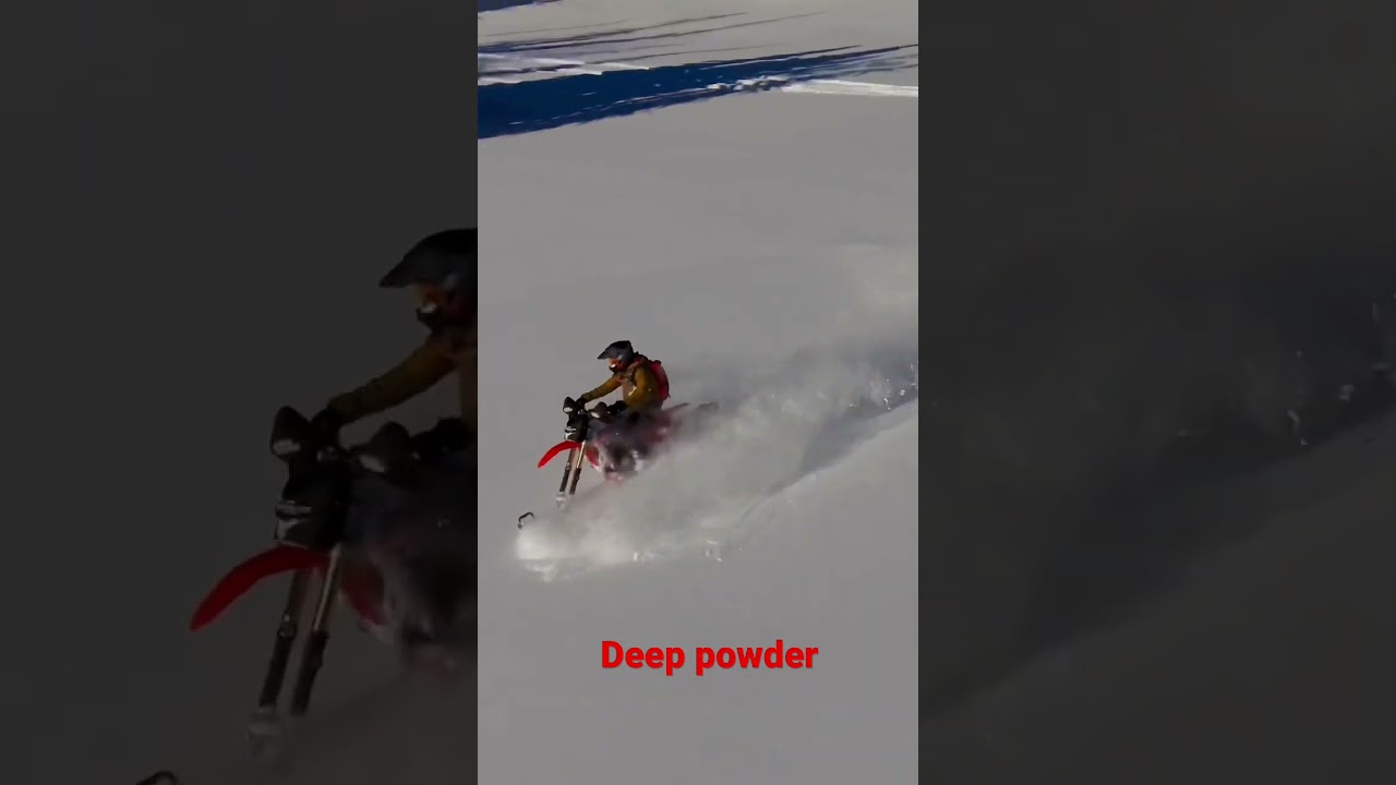 Snowbike in deep powder