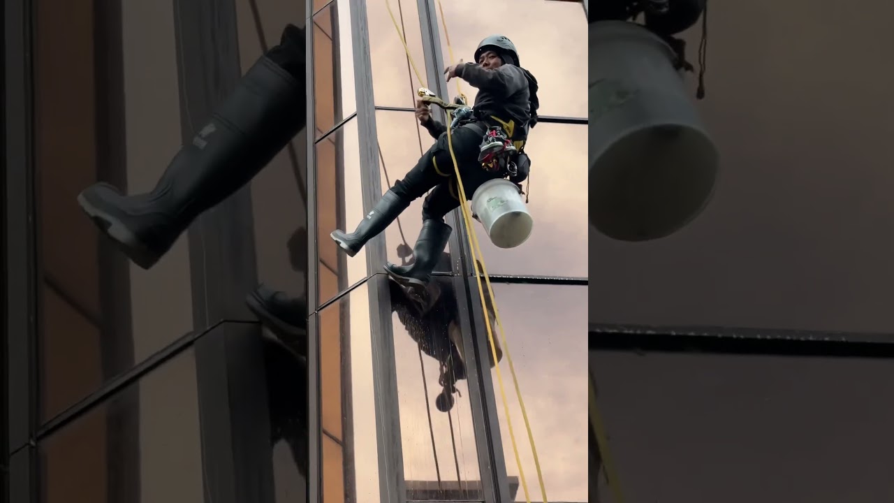 Window cleaning abseilers! Keeping the hustle real