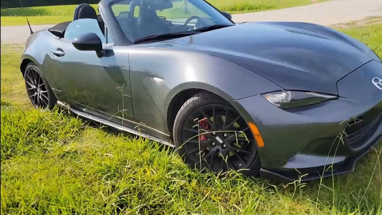 Установка ветроограничителя Maxda MX-5 2016 года с сайта windrestrictor.com