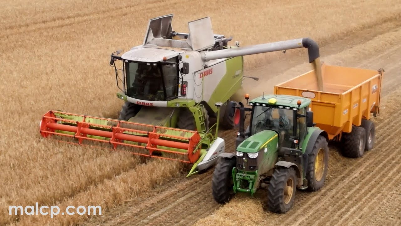Harvest 2021 - Claas Tucano 430 on an overcast day with JD 6175R & Rolland Turbovrac 20-29 trailer
