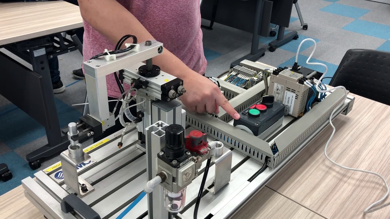PLC programming of pick and place robot arm module. 