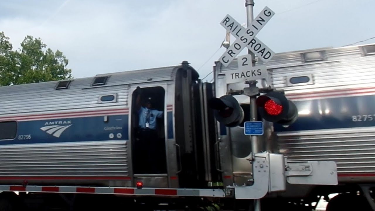 Amtrak Northeast Regional Follows CSX Freight Train