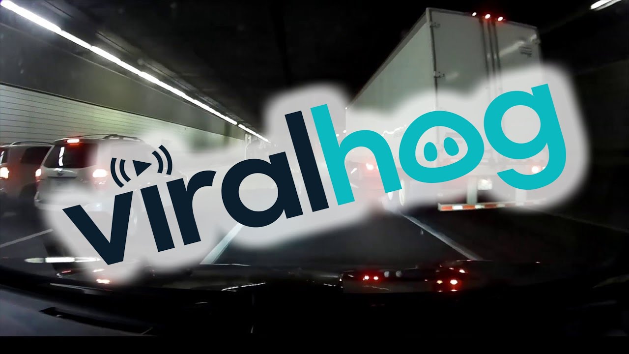 Truck Tips Over in Traffic Filled Tunnel || ViralHog