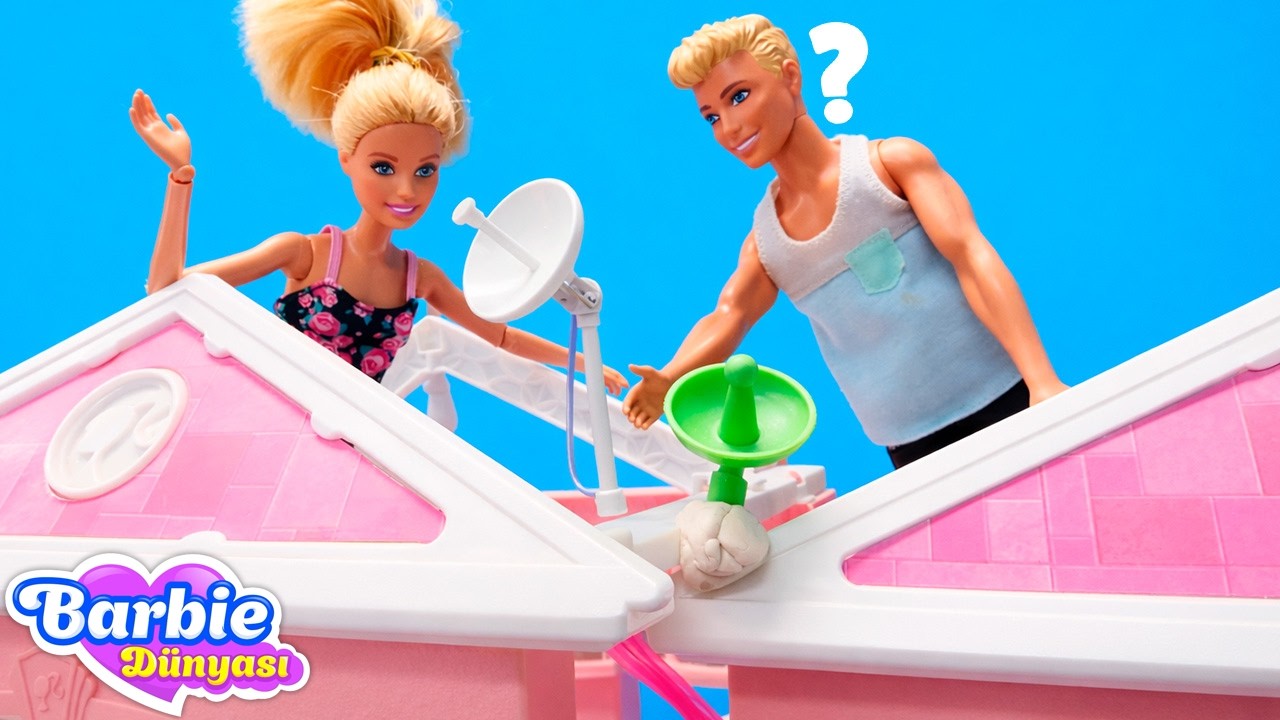 Ken rüzgarda uyduyu düzeltmeye çalışıyor: yapabilecek mi? Barbie kuklası ile videolar.