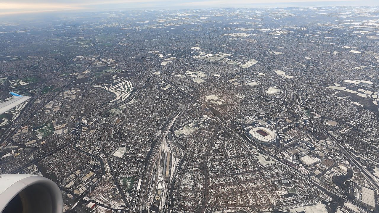Snowy Take off from London Heathrow Airport. London Landscape Covered in Snow