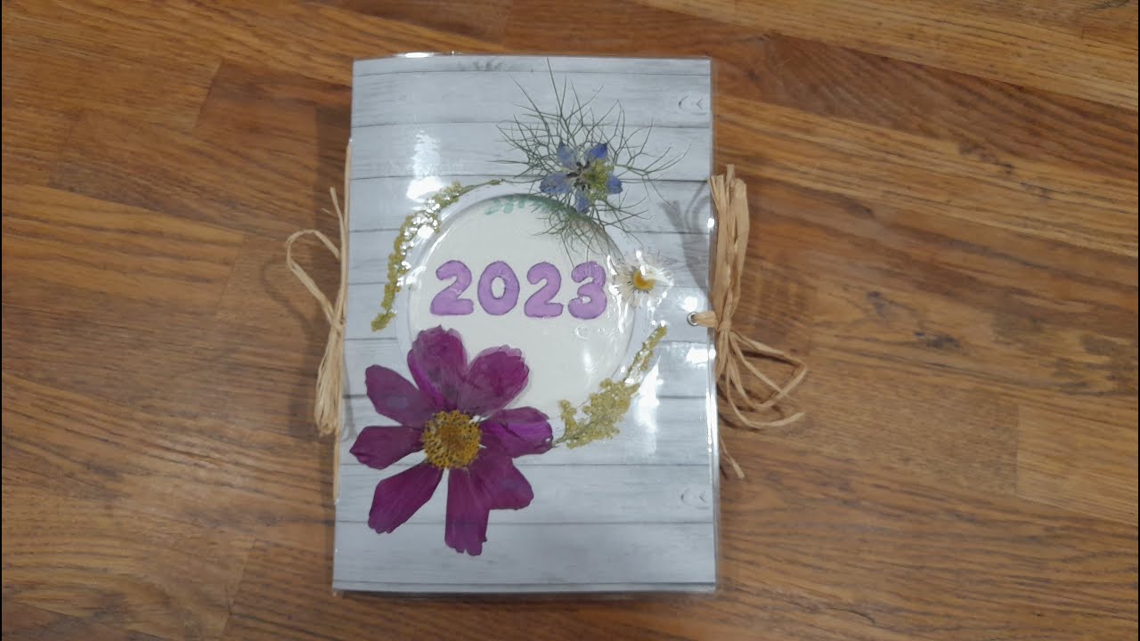 Couverture plastifiée avec fleurs séchées pour mon cahier aquarelle: Tuto