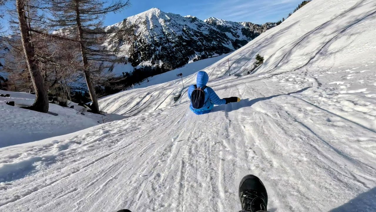 Wild sled ride down the mountain (4K UHD)