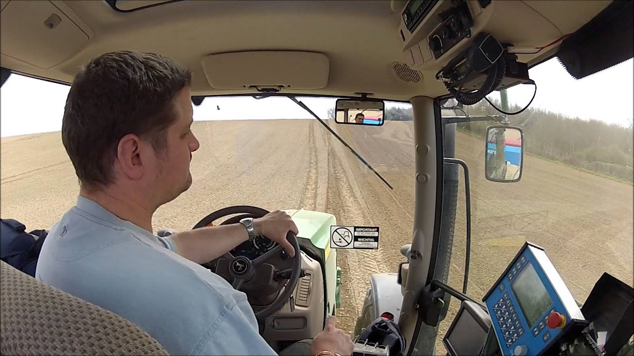 In cab with John Deere 6210r drilling rape.