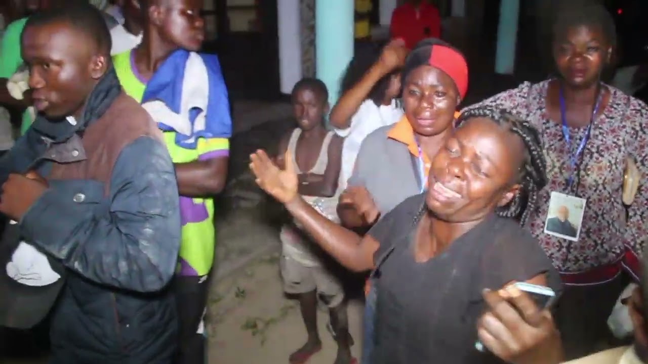 OBSÈQUES ABBÉ ALAIN LANET'S 1ère  PARTIE ARRIVÉE  CORPS À IDIOFA +243812086300