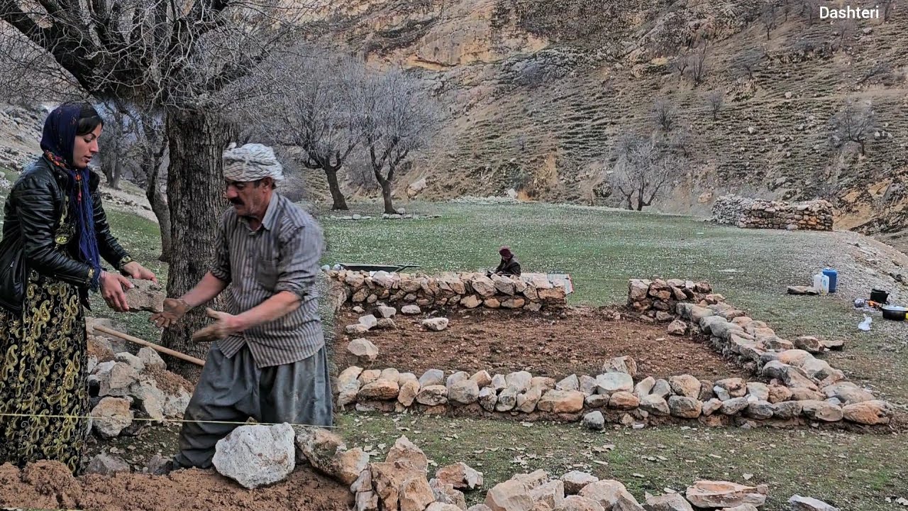 Layla in the mountains, making the roof and working on the roof and laying the foundation of a new h