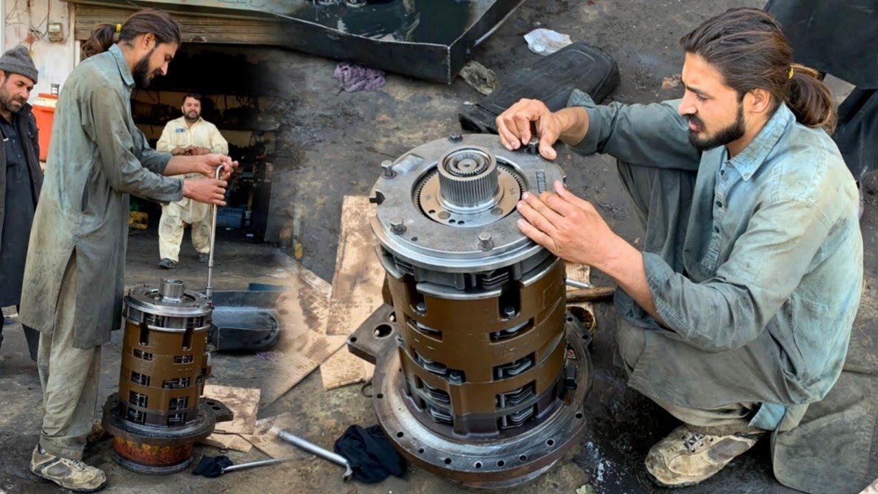 How Experts Reassemble Cat Wheel Loader Transmission in Local Workshop