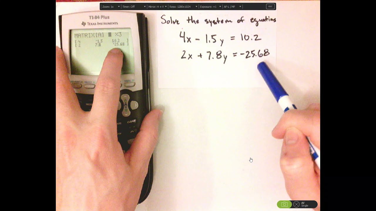 Алгебра с помощью калькулятора TI-84 Plus — решение системы уравнений — двумя способами.