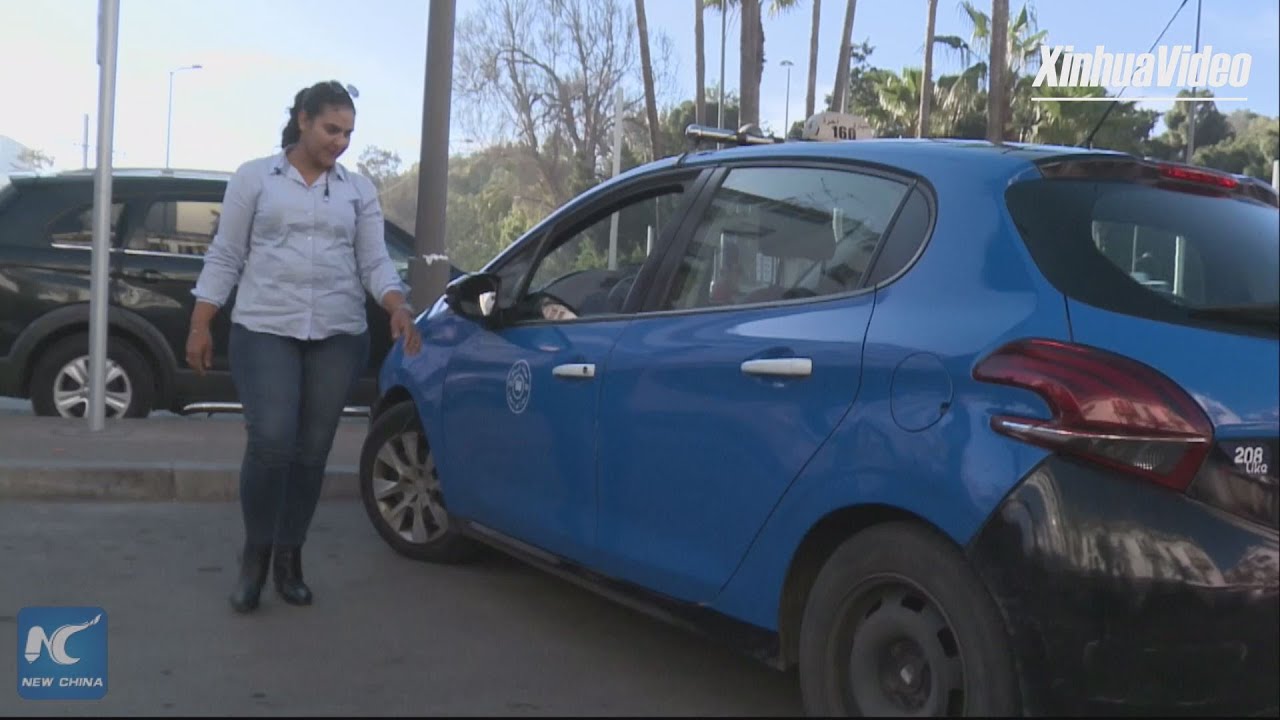 Moroccan woman pursues independence as taxi driver
